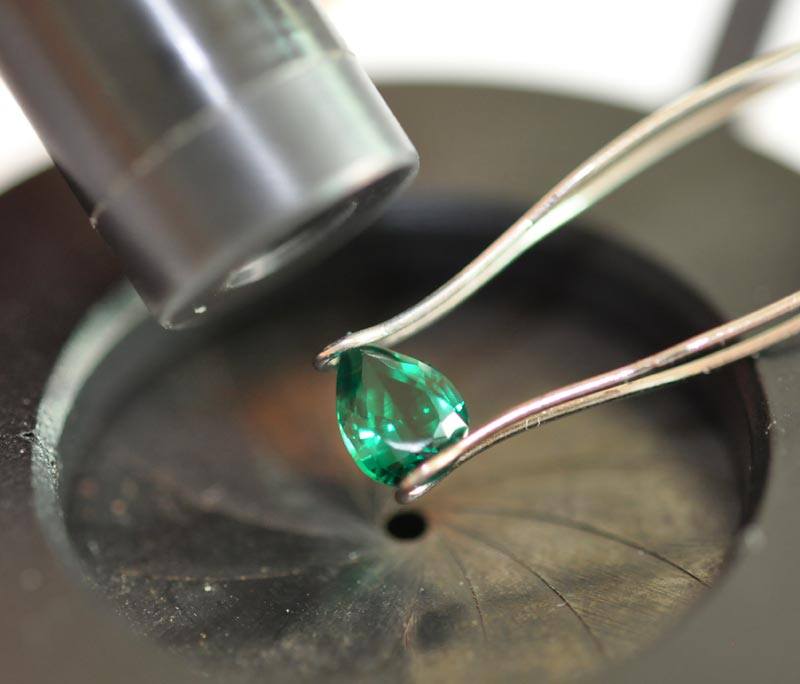 Spectroscope and Emerald, being examined by resident Filipino gemologist in Manila